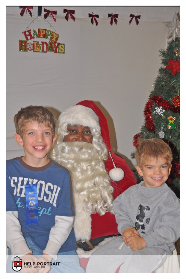 Santa visits with children during the 2013 Portraits of Hope at the Greater Cleveland Salvation Army