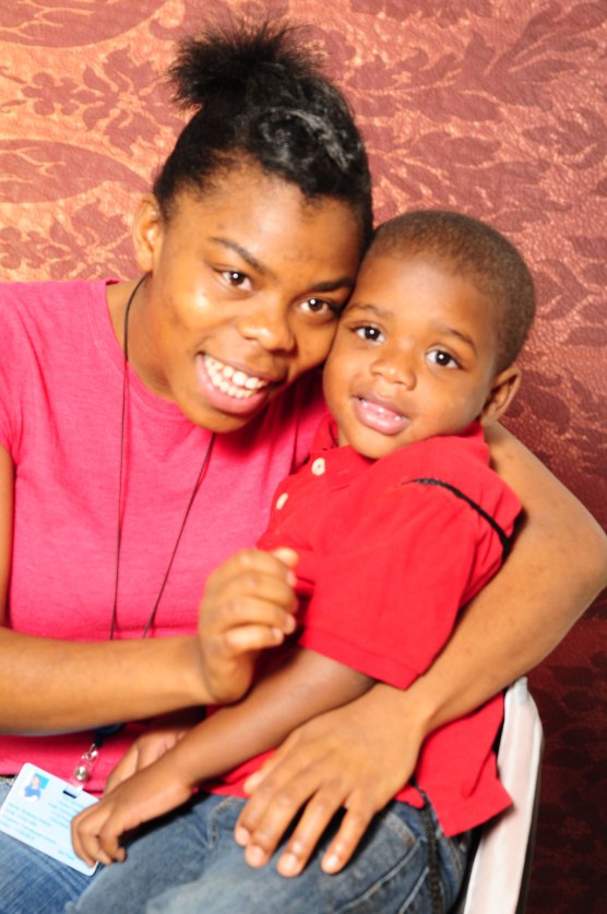 The joy found in this mom's eyes sums up the work we try to accomplish through Help-Portrait (Photo by Stephanie Briggs)